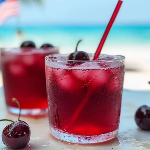 Un verre de boisson pétillante vanille cerise.