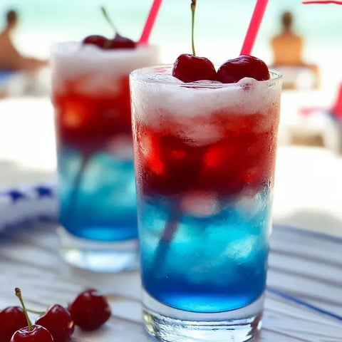 Deux verres de boisson bleu blanc rouge pour enfants.